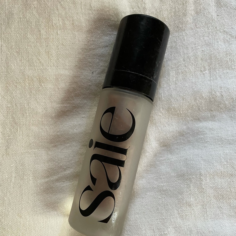 Saie Glowy Super Gel lightweight dewy highlighter shade “sunglow”